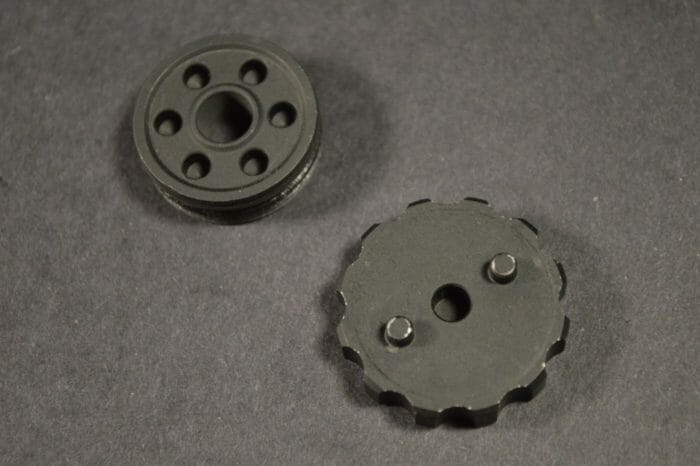 Disassembly tool (right) and front cap (left)