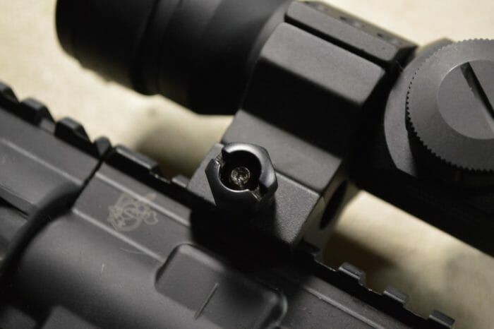 The unit as a whole is then held in place on the rifle’s rail with a single hex nut and screw