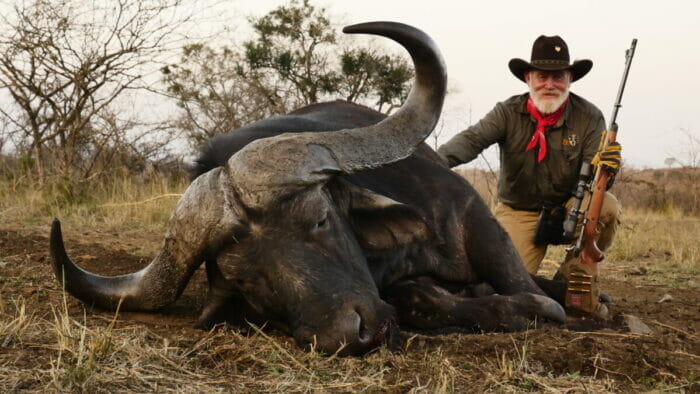 Larry with his best Cape Buffalo, taken with a .416 Ruger shooting Hornady 400-grain DGX.