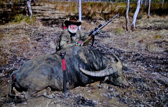 Larry with one of his Australian buffalo taken with a .375 Ruger shooting Hornady 300-grain DGX ammo.