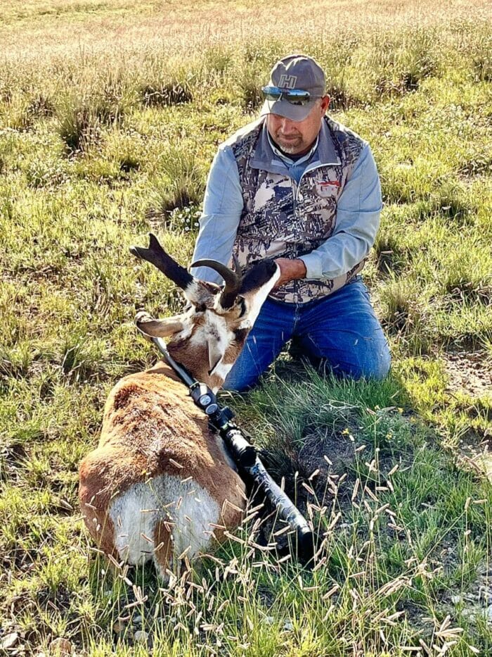 Andy Iverson admires his RLE Outfitters pronghorn.