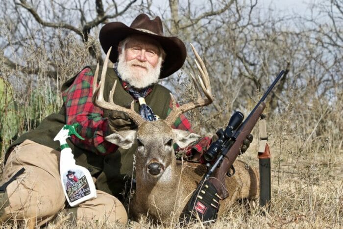 Larry Weishuhn with a whitetail he rattled in.