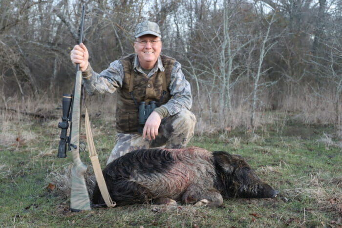 Author, MG Arms rifle and sow feral hog taken at ~75 yards with a single 162-grain Hornady ELD-X bullet that struck the pig in the shoulder