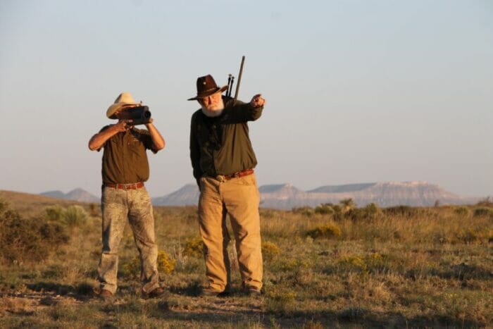 Larry and his guide have just spotted a distant pronghorn and will next decide how to stalk closer.